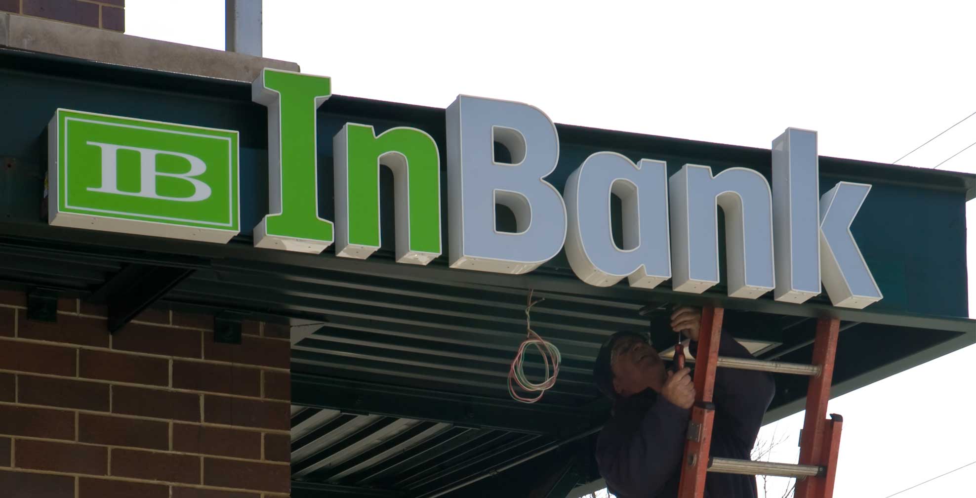 inbank_sign_b.jpg Art Direction by: Bart Crosby, Crosby Associates